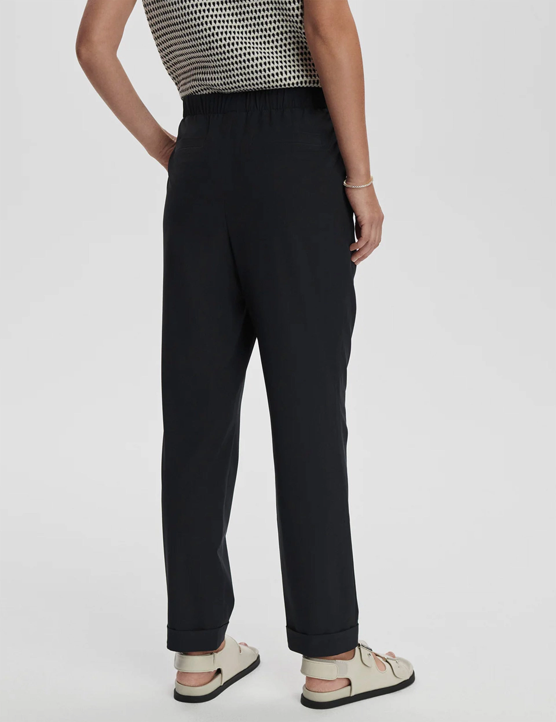 Alana Slim Tapered Cuff Pant 27" - Black Zero Edge Pocket Design