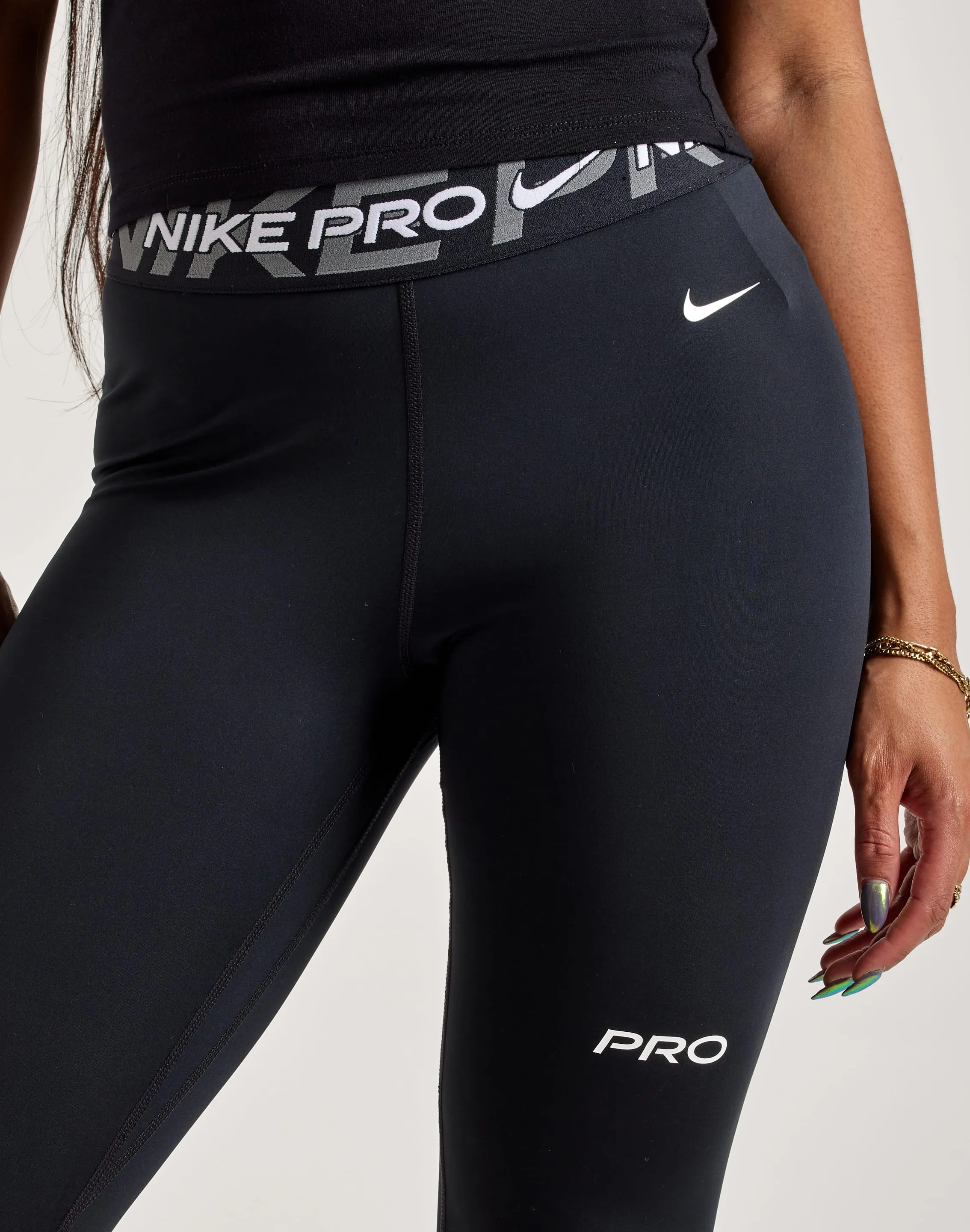 Training Fit TearResistant Material Nike Pro Mid-Rise Graphic Leggings