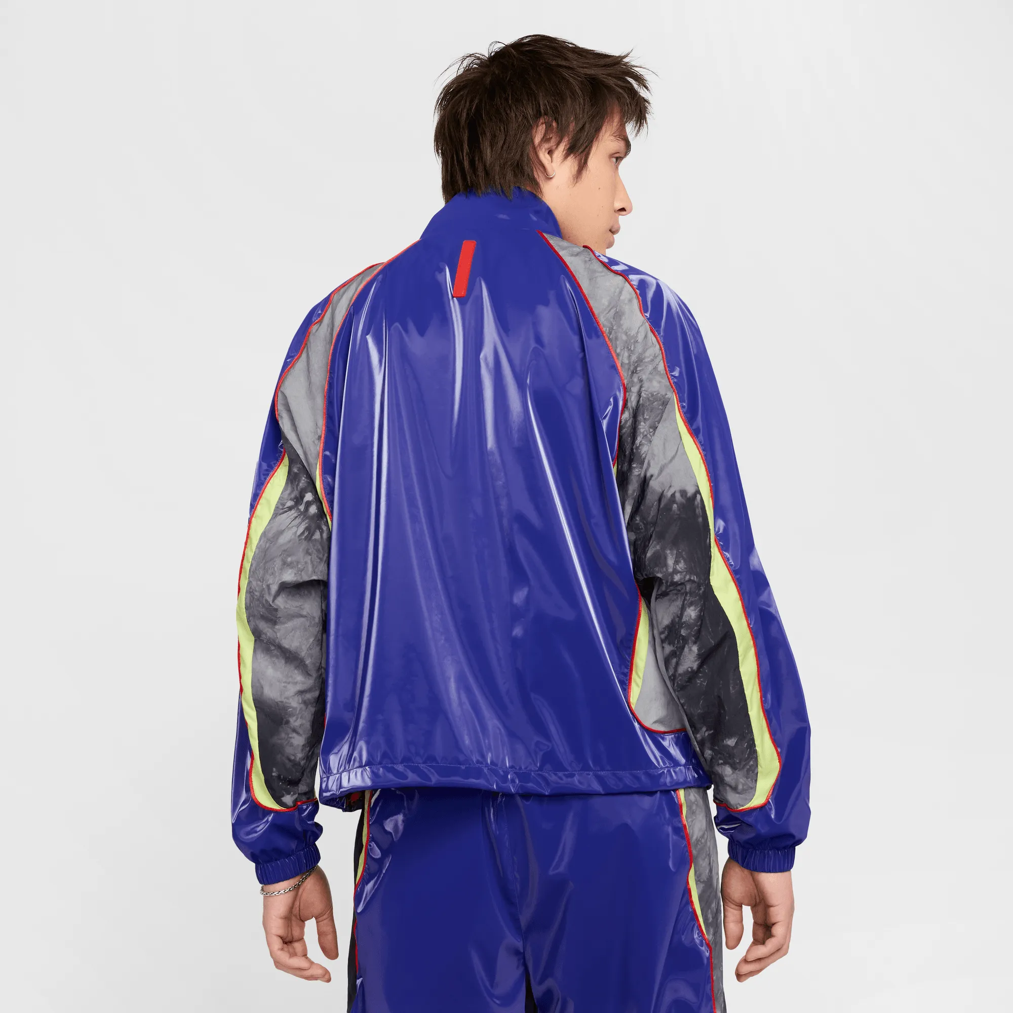 NIKE PROJECT F.R.O.G TRACK JACKET - DEEP NIGHT / LIGHT CRIMSON Seamless transition Jewel tone