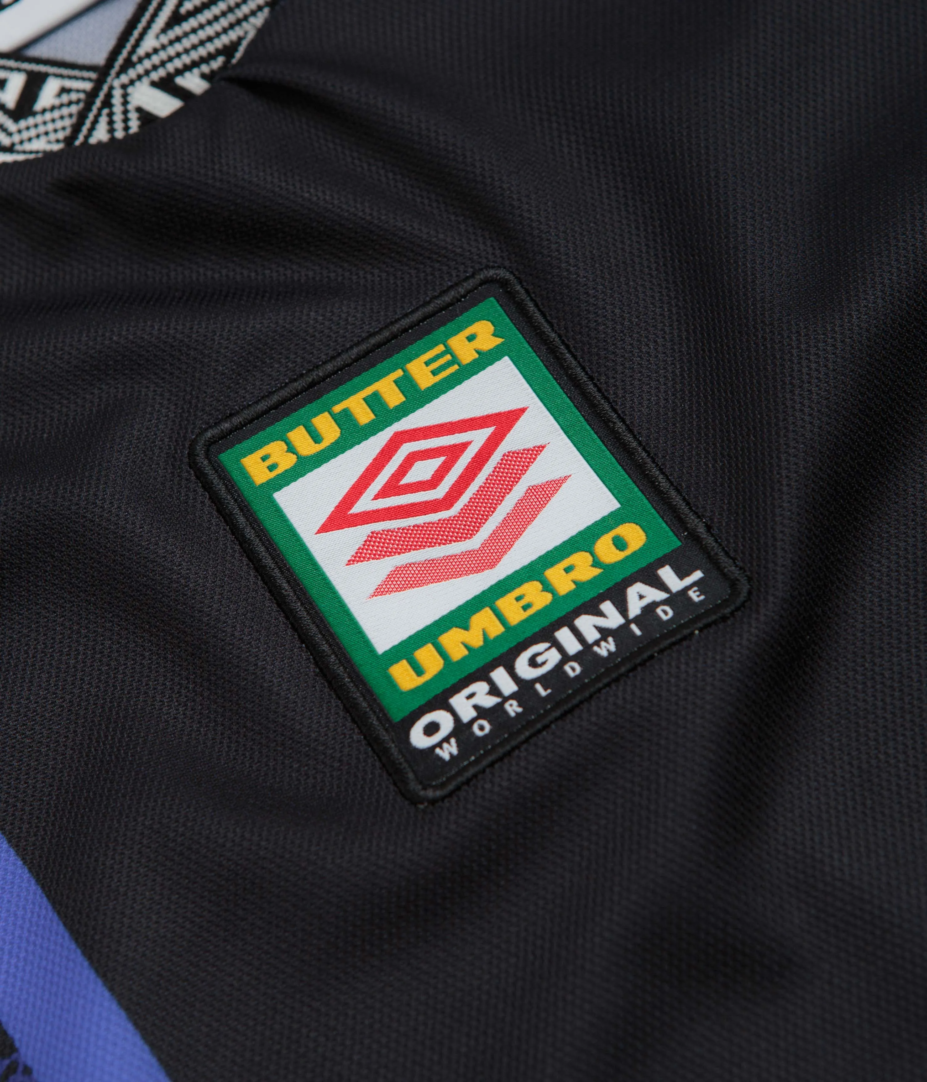 Butter Goods x Umbro Goalie Jersey - Black / Blue Garment Washed Texture