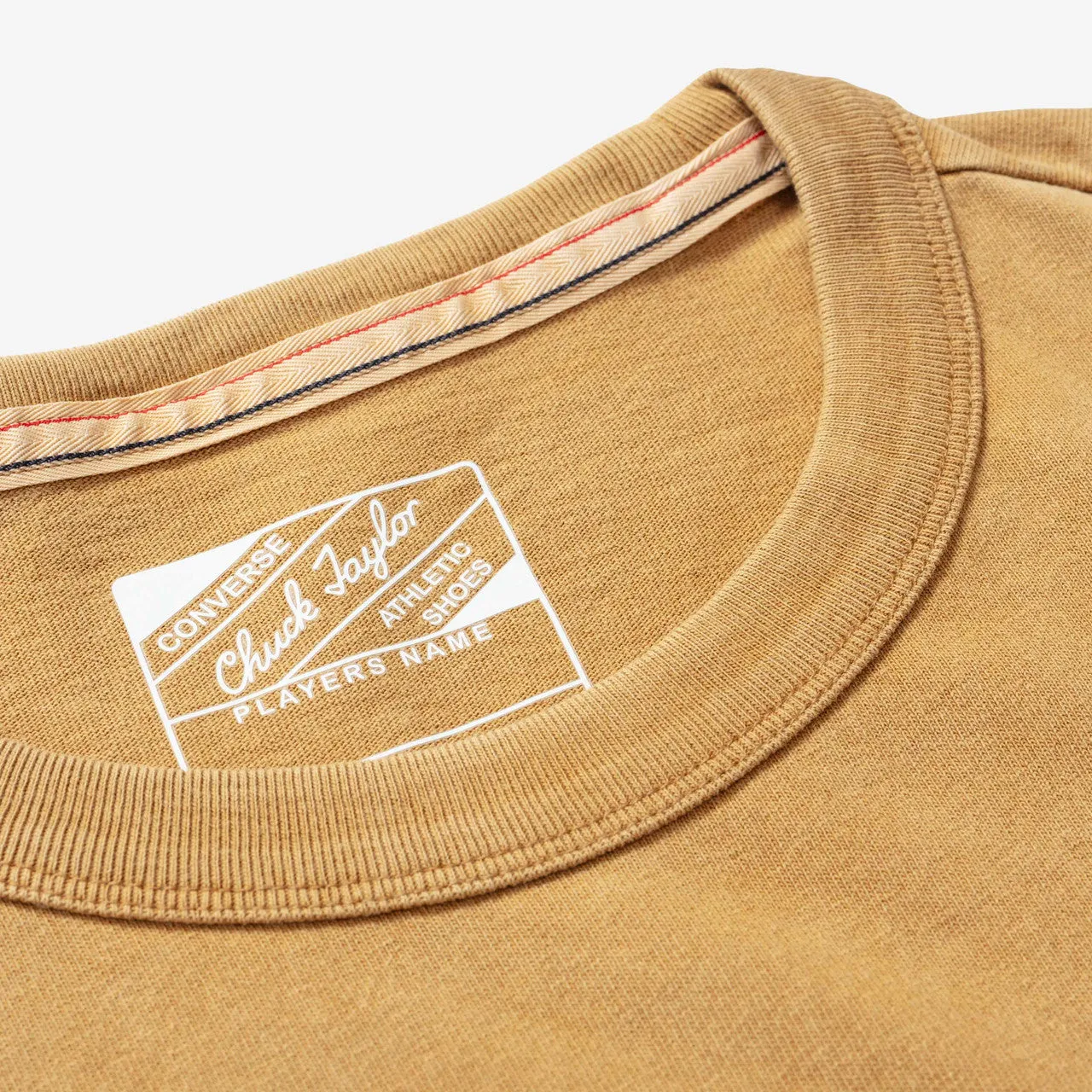 Gold Standard Tee x IRAK rooftop event shirt silhouette