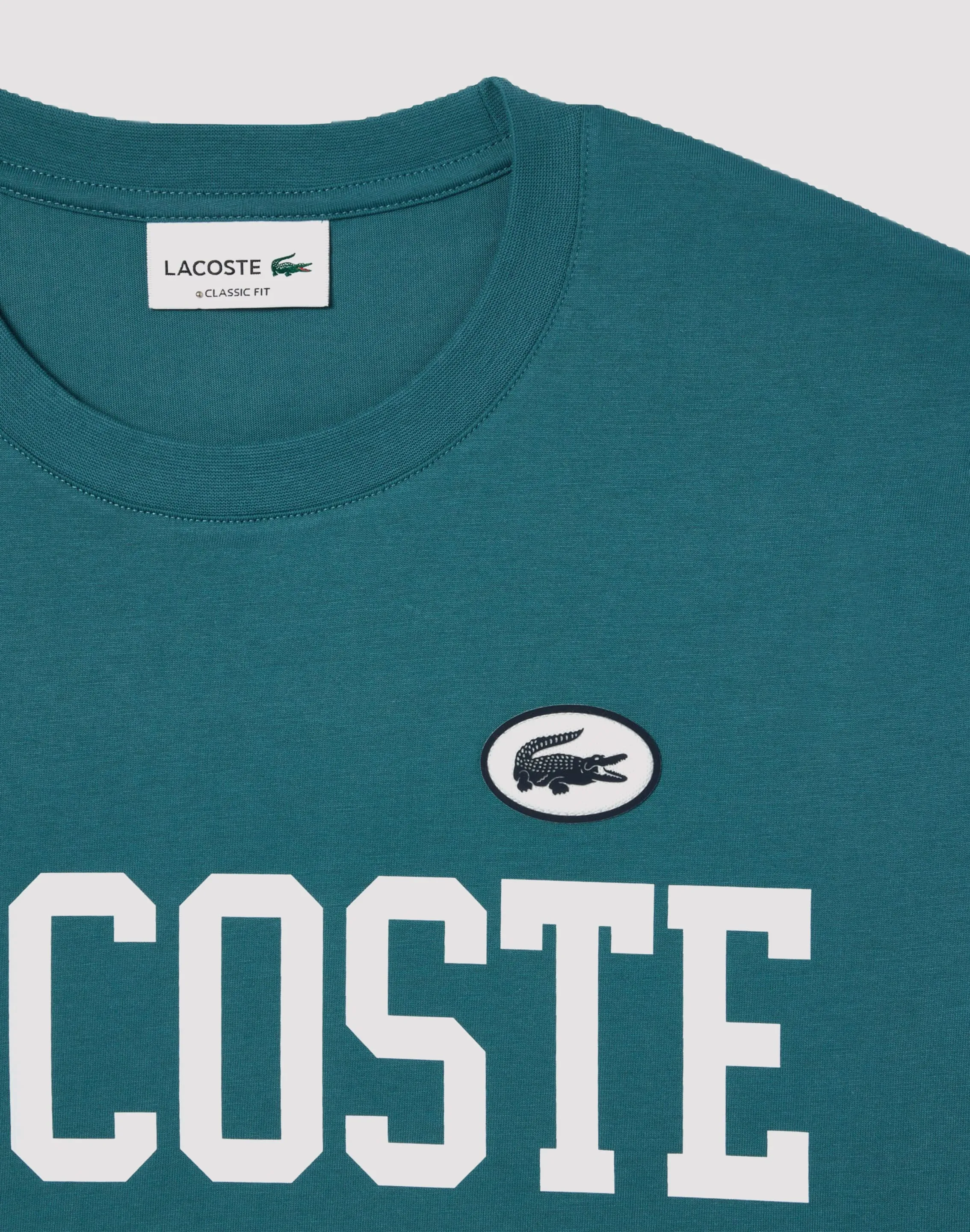 Trend Glow Flexible Joints Lacoste Varsity Logo Teal Tee