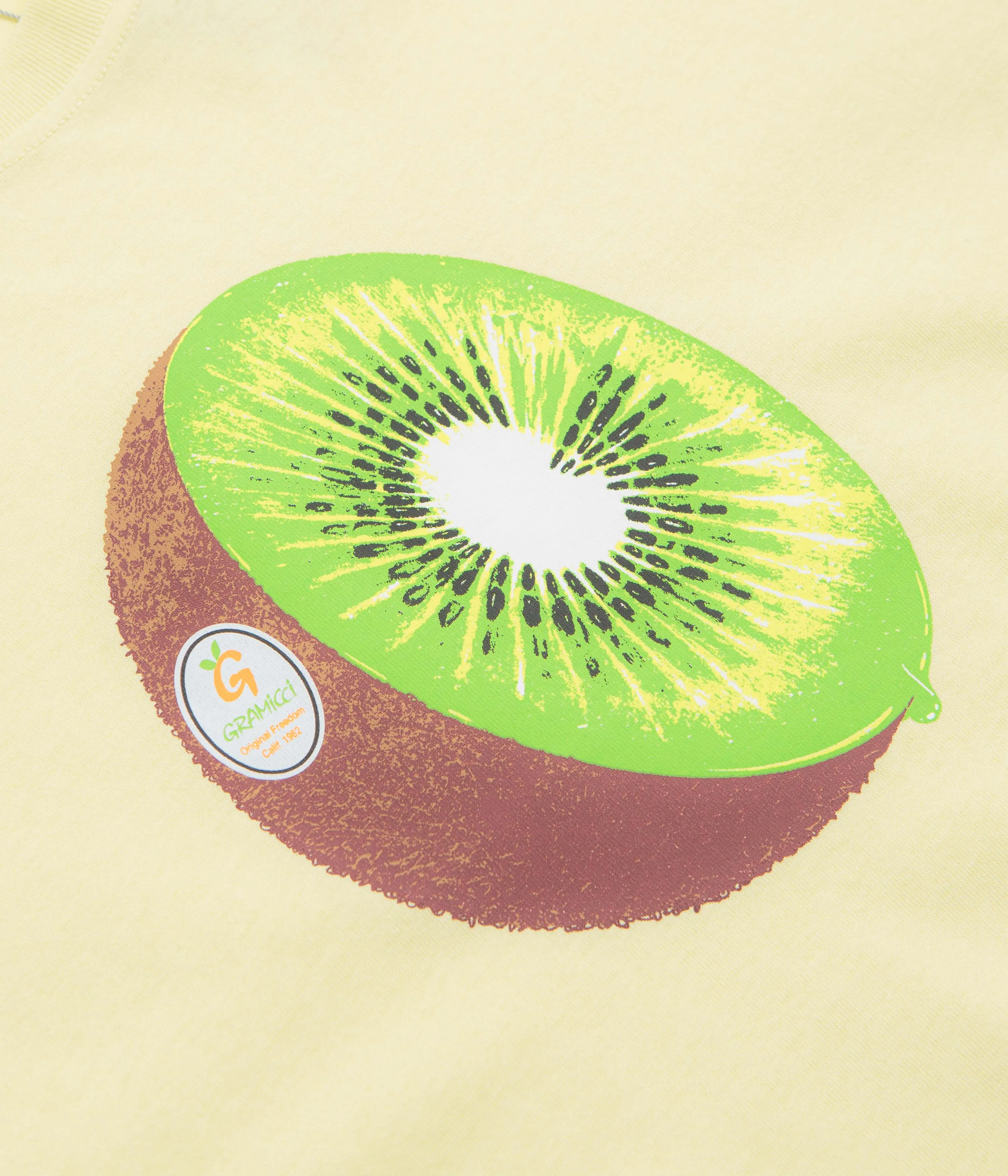 Gramicci Kiwi T-Shirt - Lemon Camping site squash venue