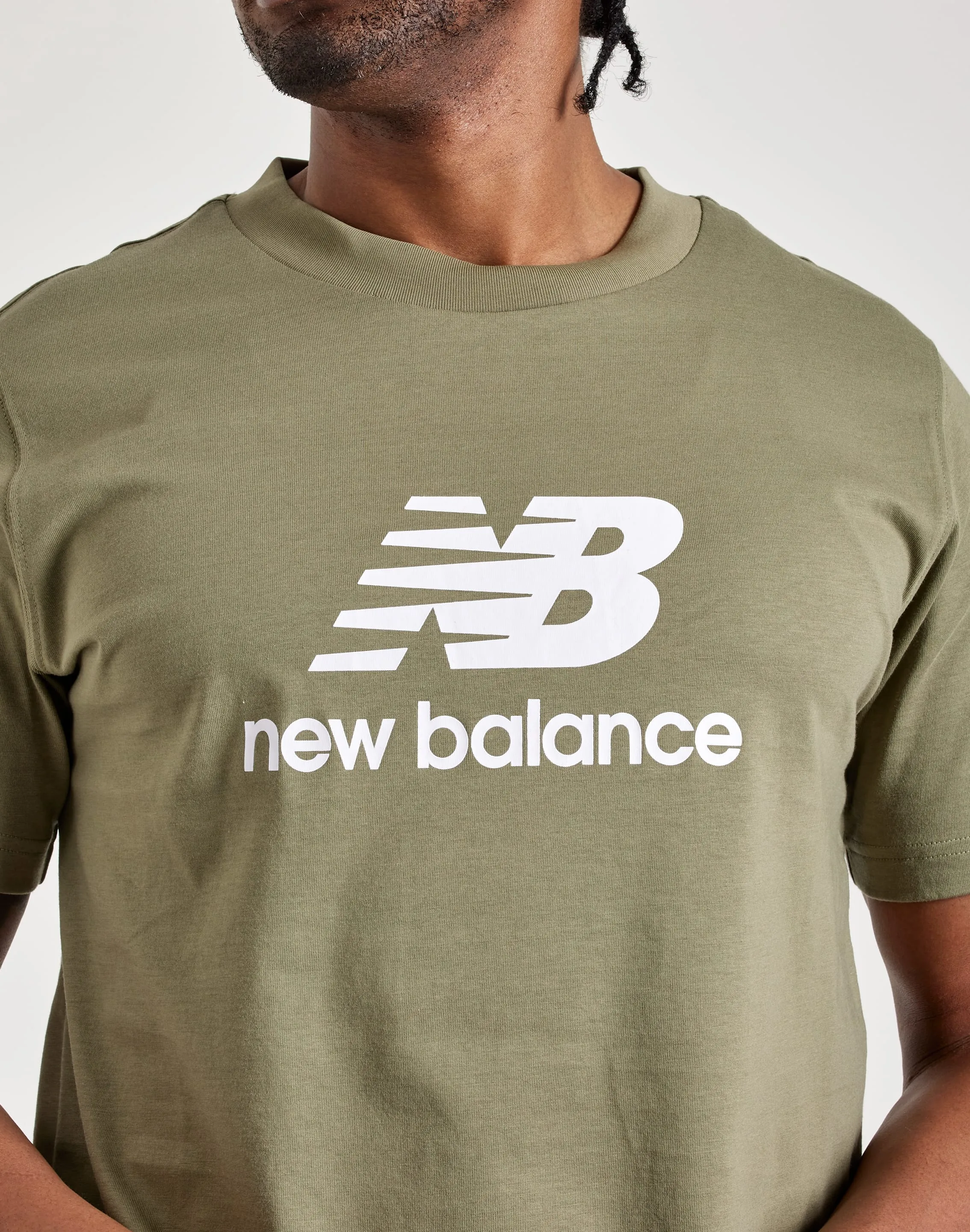 New Balance Essentials Stacked Logo Tee CrossBackStructure NonRestrictiveFit