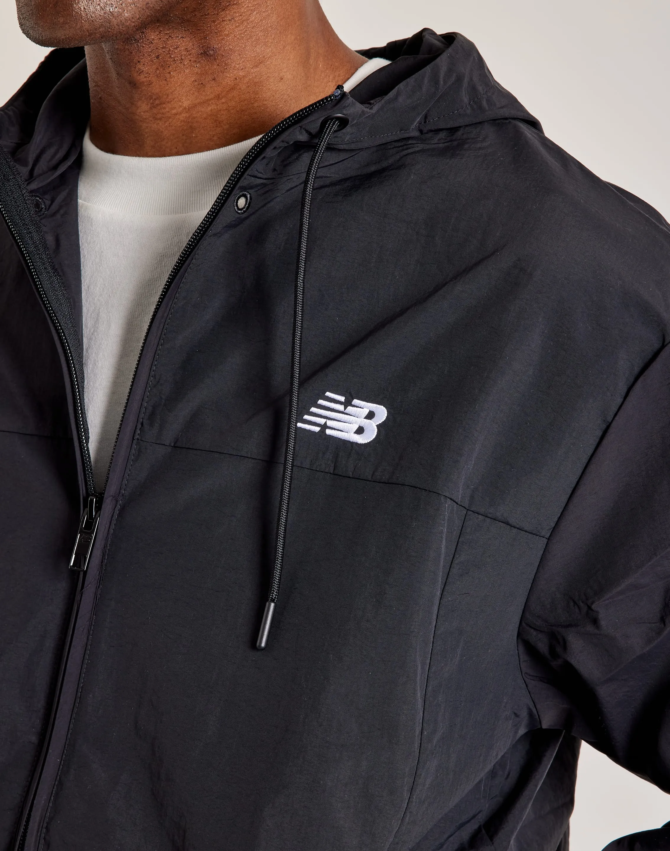 New Balance Athletics Woven Jacket Mesh Glow AntiStaticMaterial