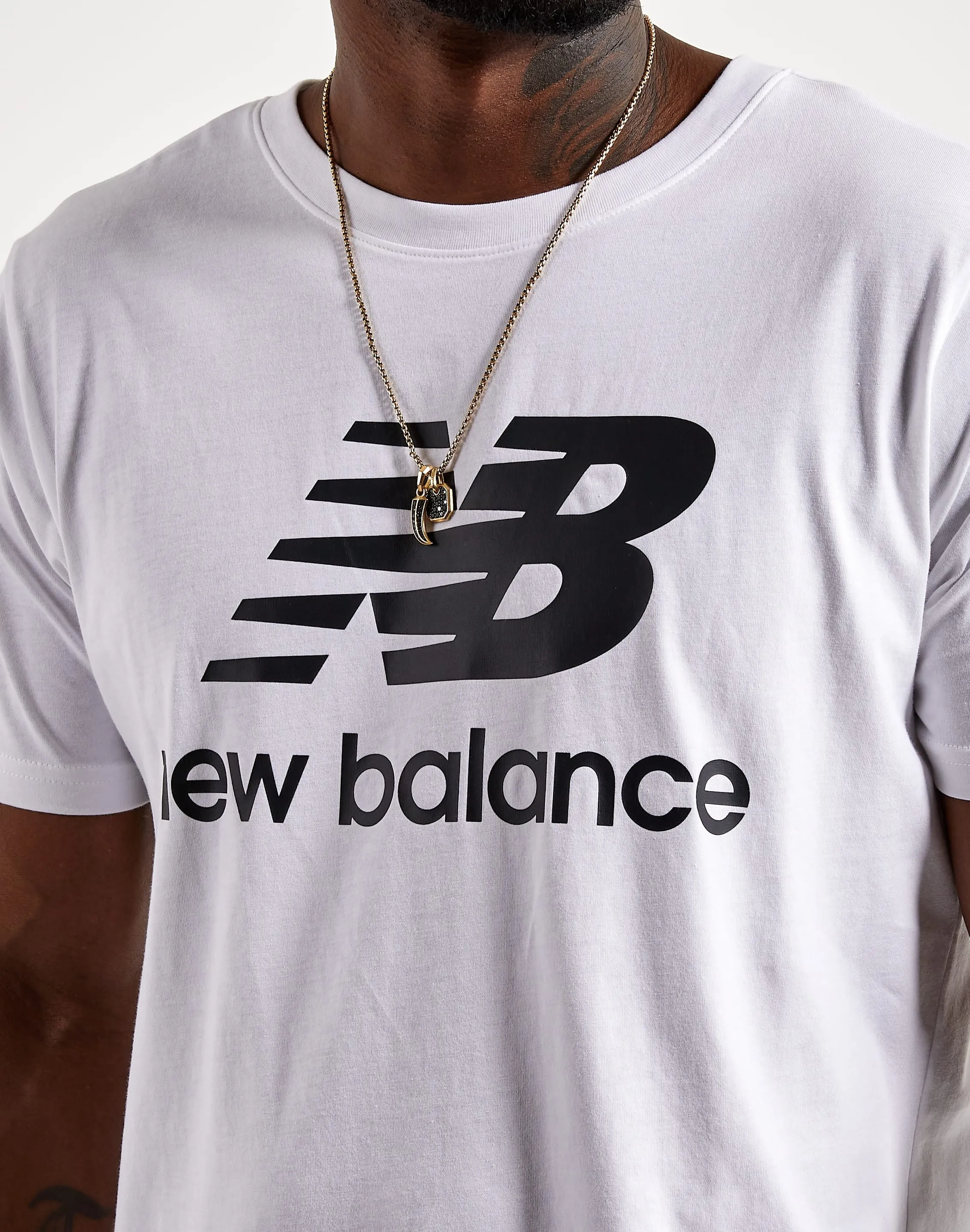 HiddenZipperClosure MoistureWicking New Balance Essentials Stacked Logo Tee