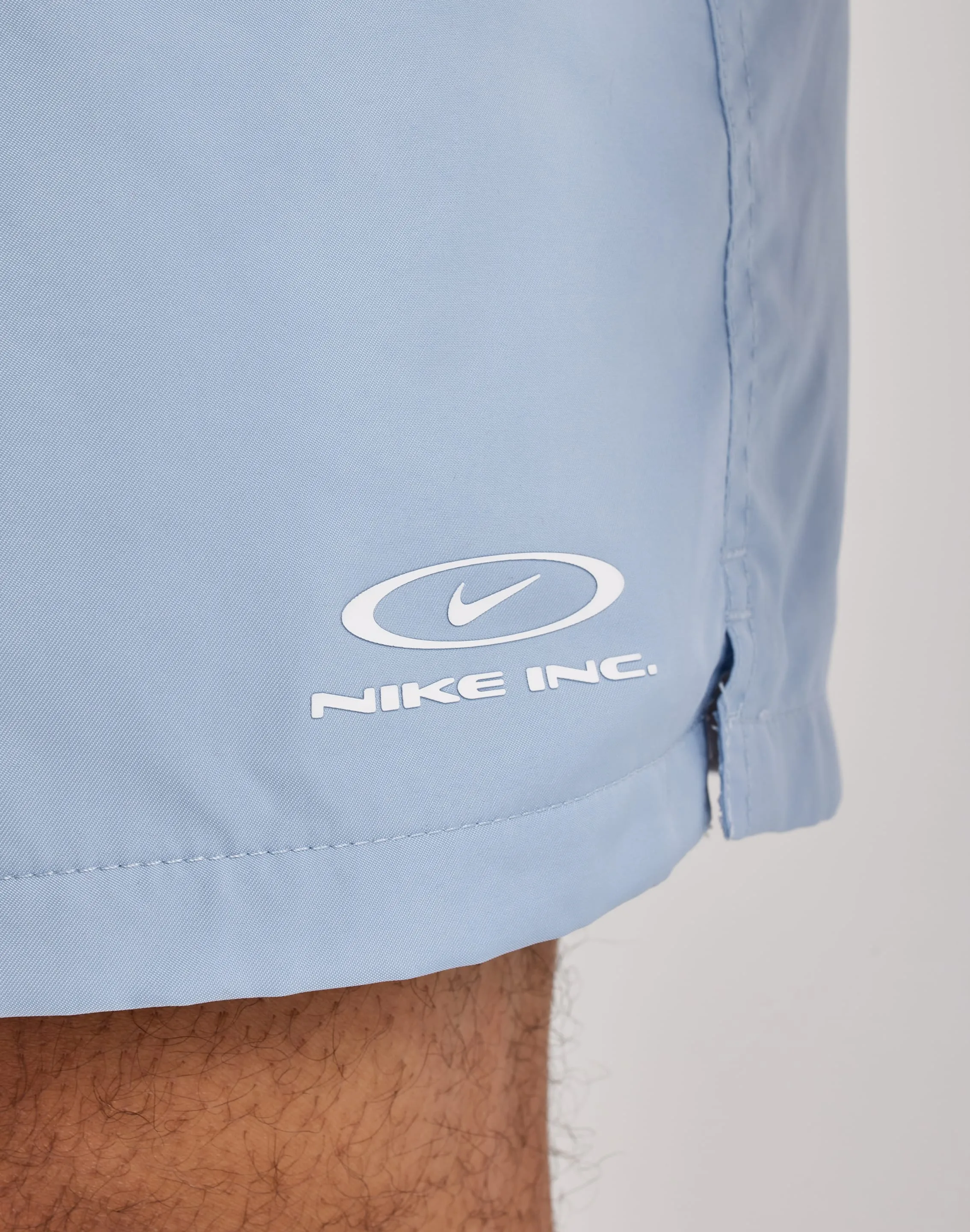 NonRestrictiveCut Nike Club Flow Shorts