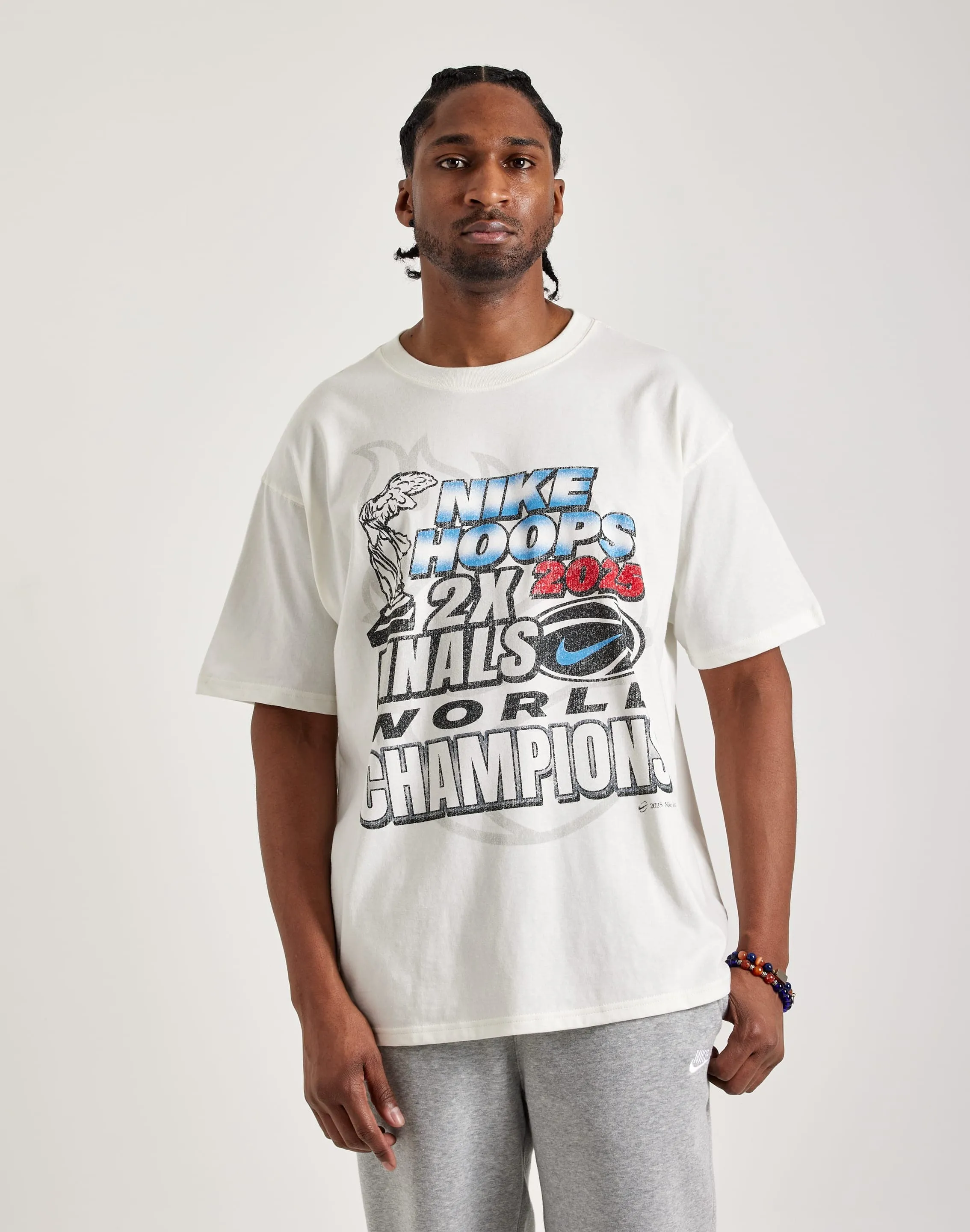 Nike Hoops World Champions 2025 Tee Run Glow Team Vibe