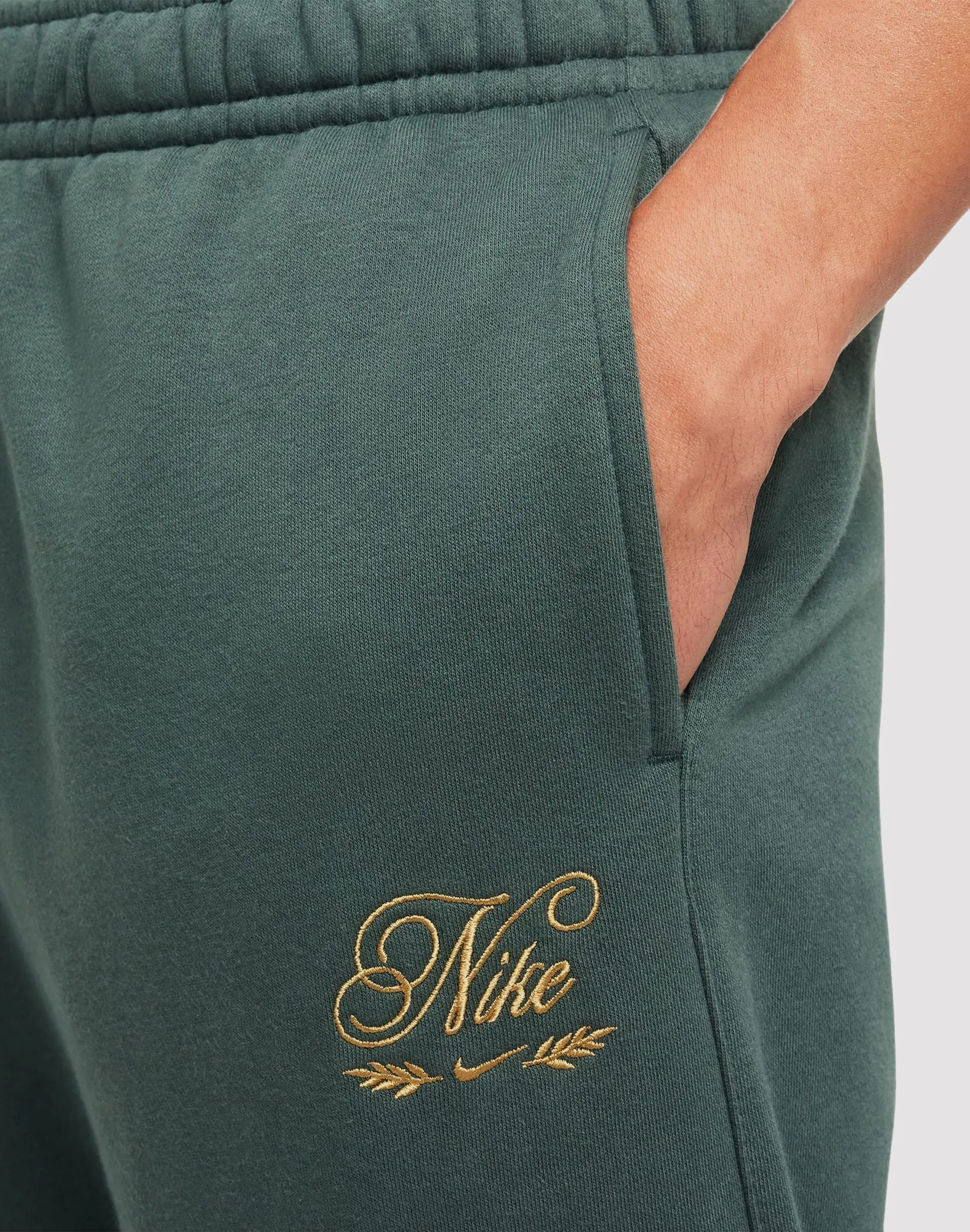 CompactFold Sport Glow Nike Sportswear Club Fleece Green Joggers