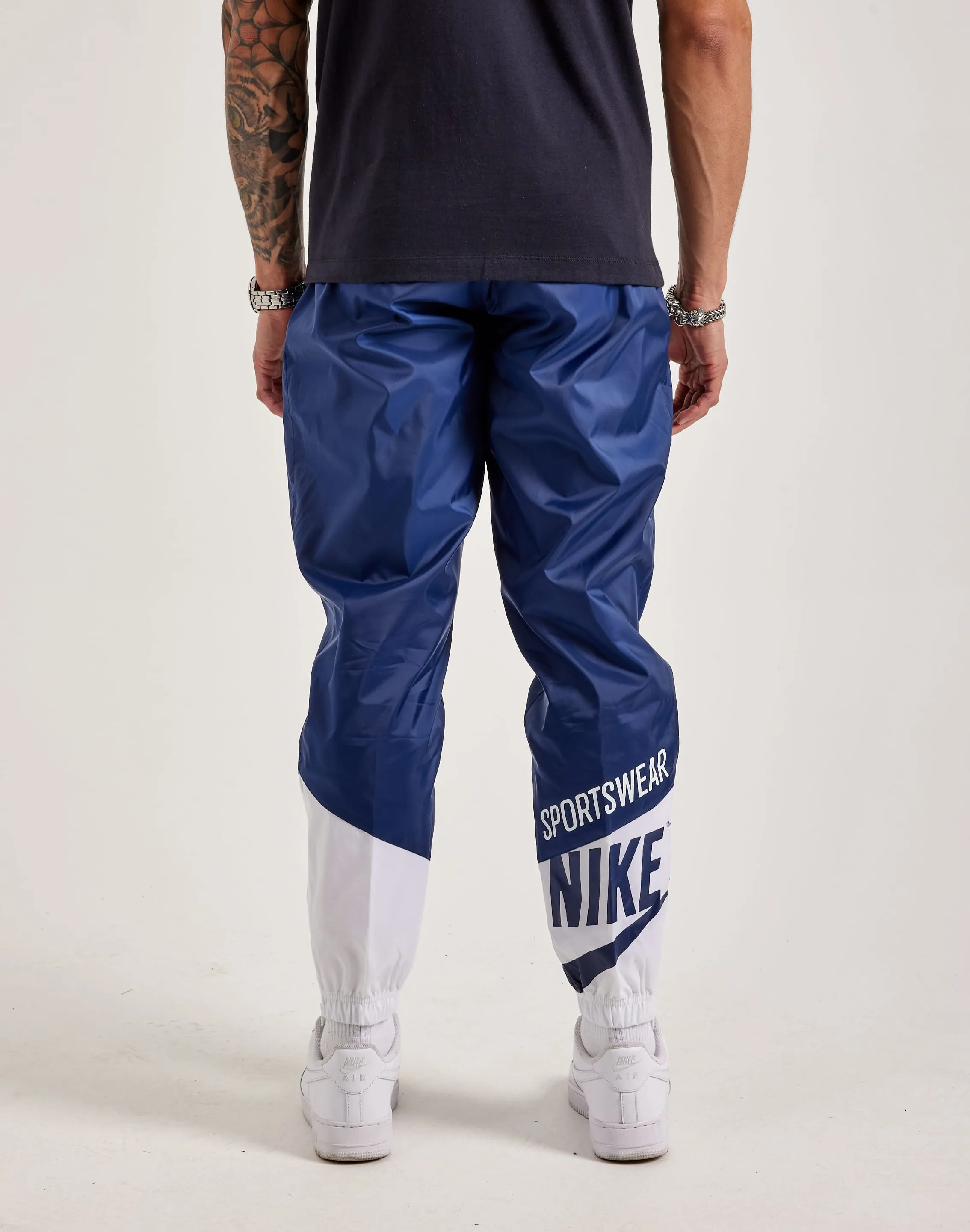 AntiStatic Treatment Nike Sportswear Woven Graphic Pants
