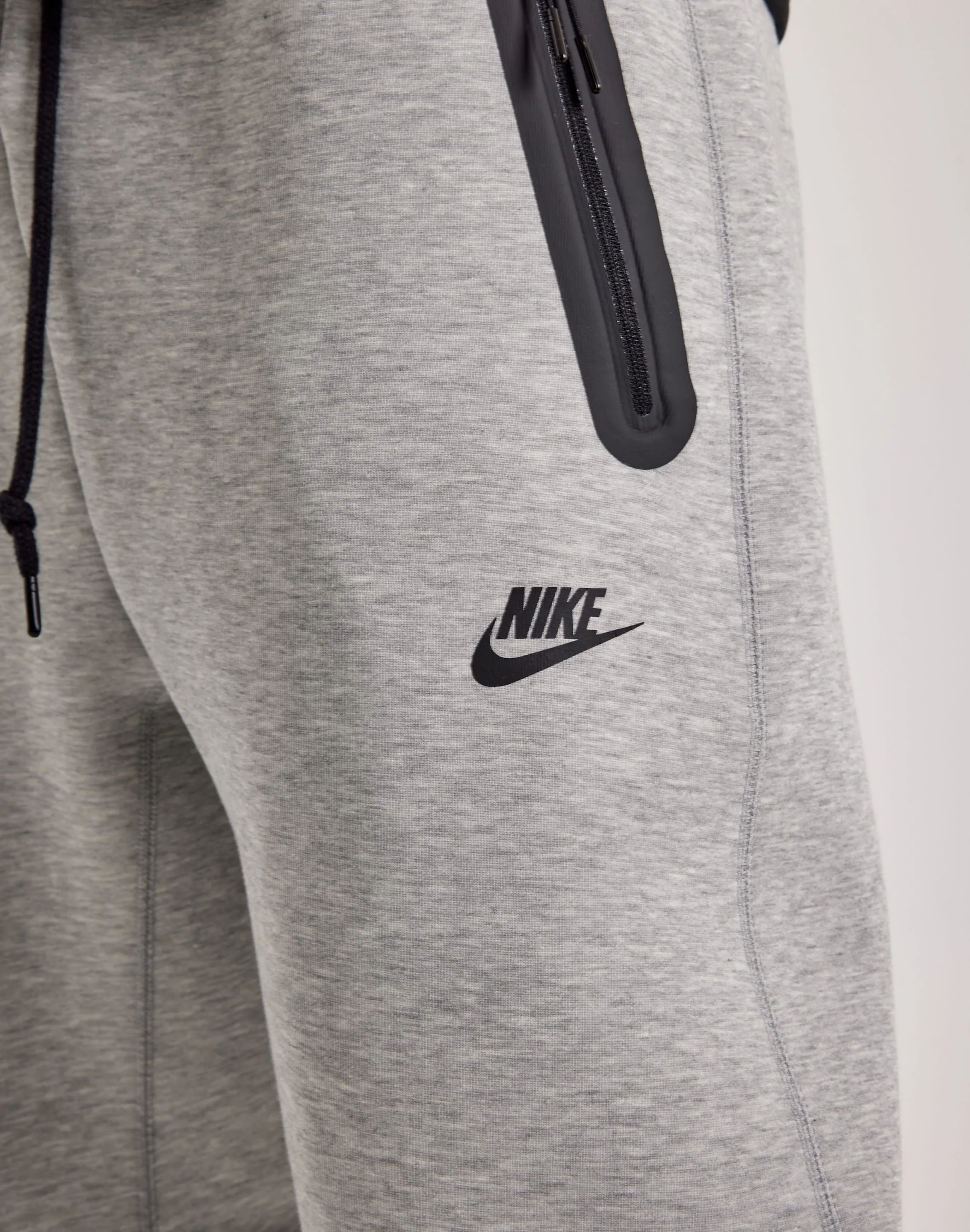 Nike Tech Fleece Open-Hem Pants Spanish Glow Breathable mesh lining