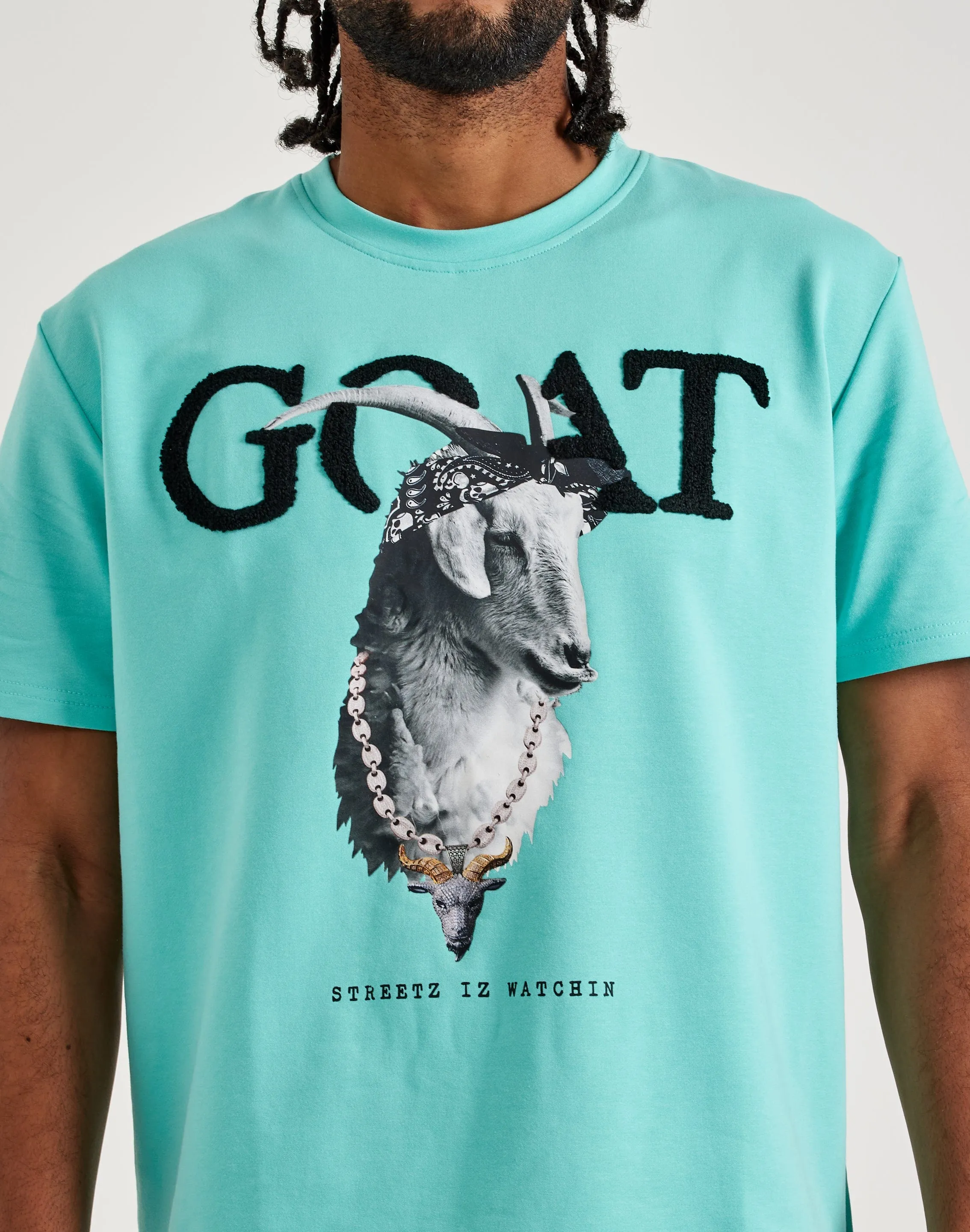 Saga Fit Icon Glow Streetz Iz Watchin Goat Tee