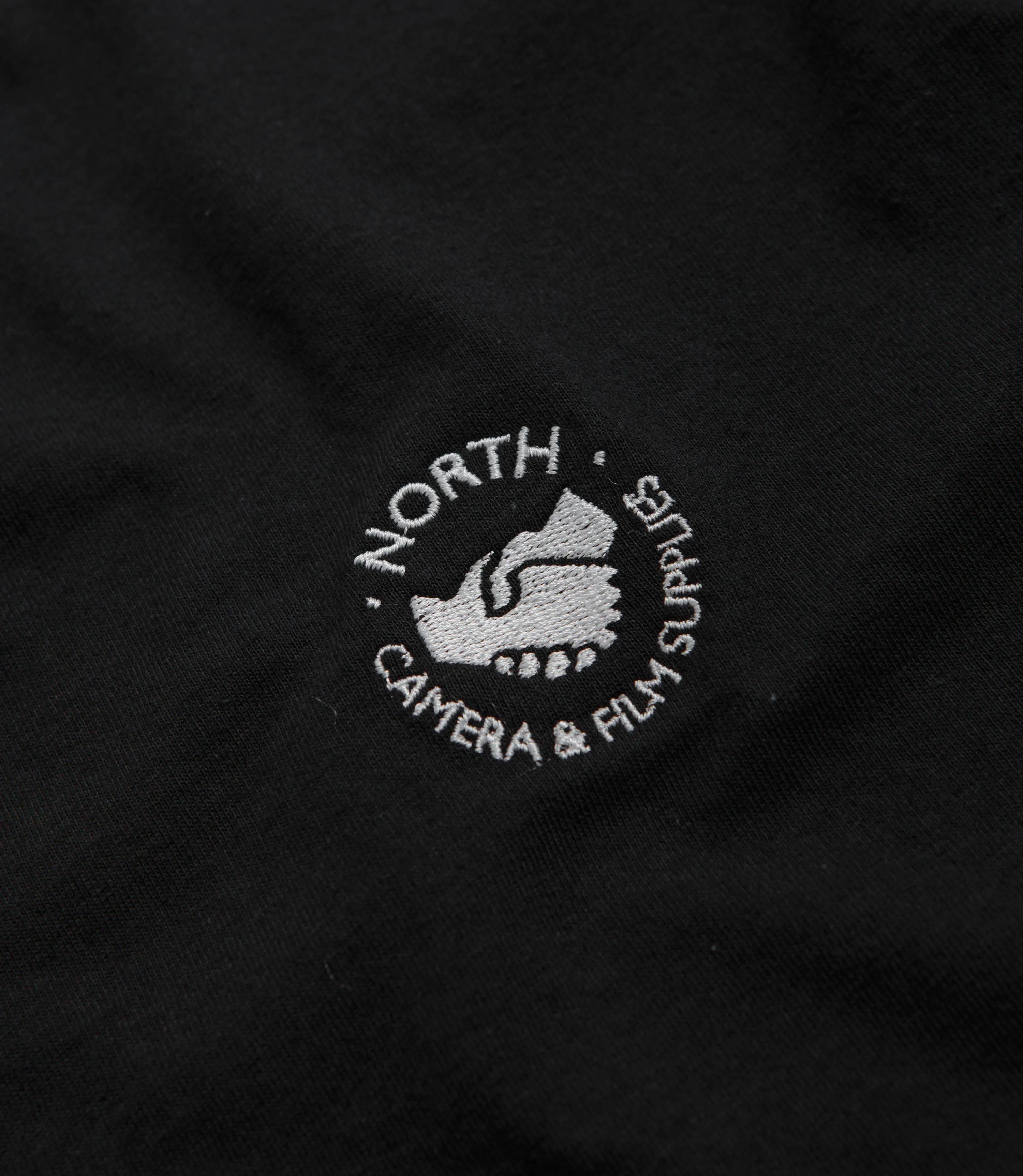 North Supplies Logo T-Shirt - Black / White Minimalist Design tee shirt