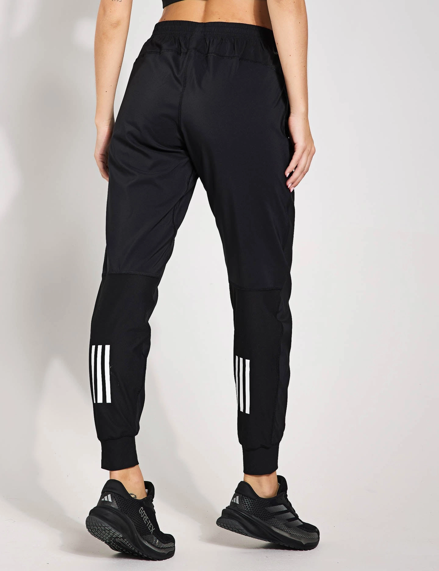 Odor Control Treatment UV Protective Coating Own the Run Joggers - Black
