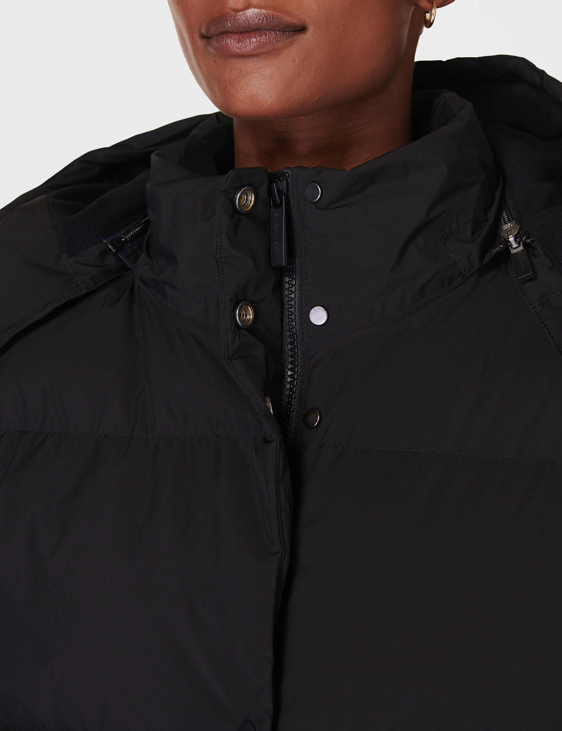 Nimbus Short Puffer - Black Articulated Elbows Compact packaging