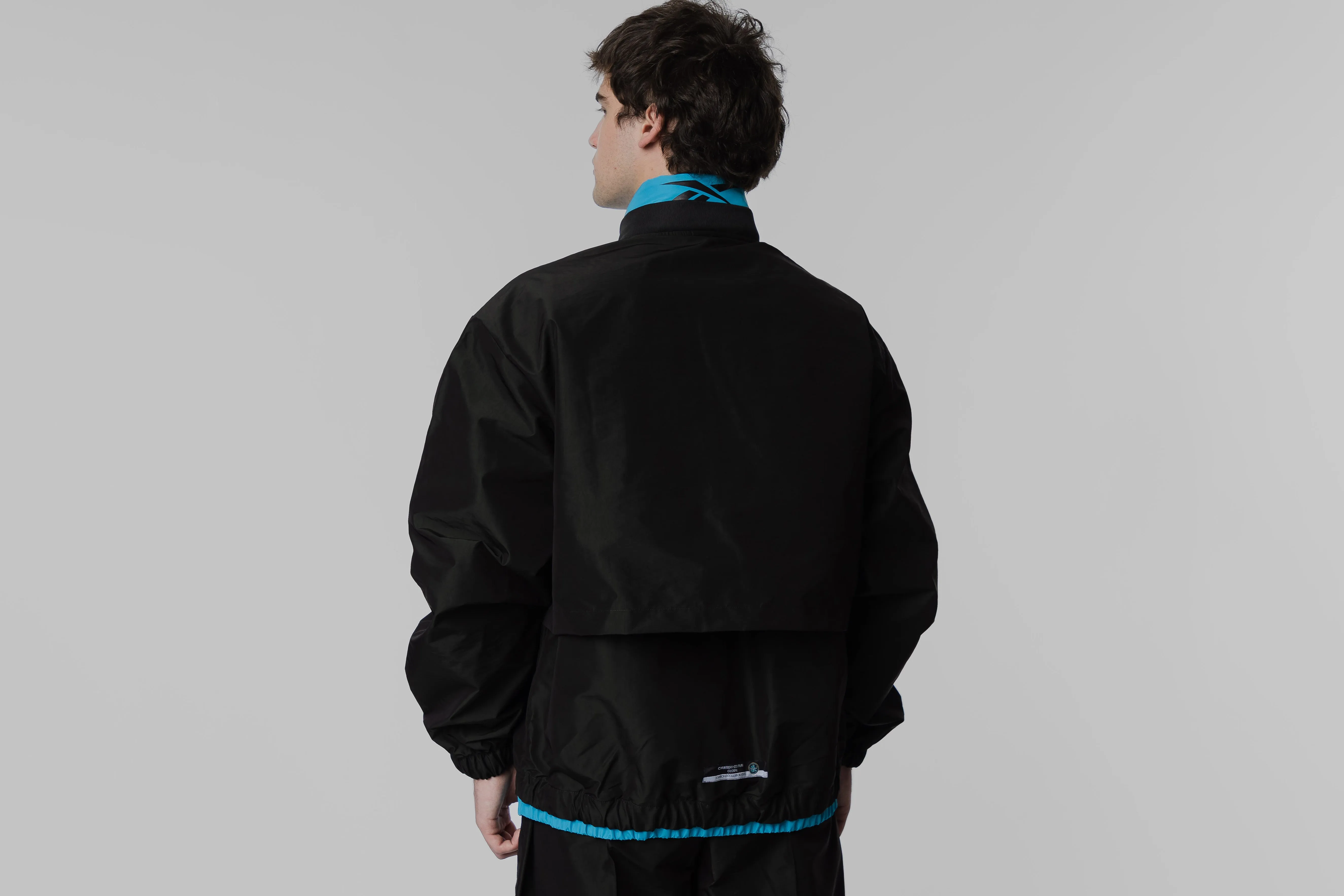 Sustainable Production Methods Light Fabric Reebok x Botter Vector Track Jacket