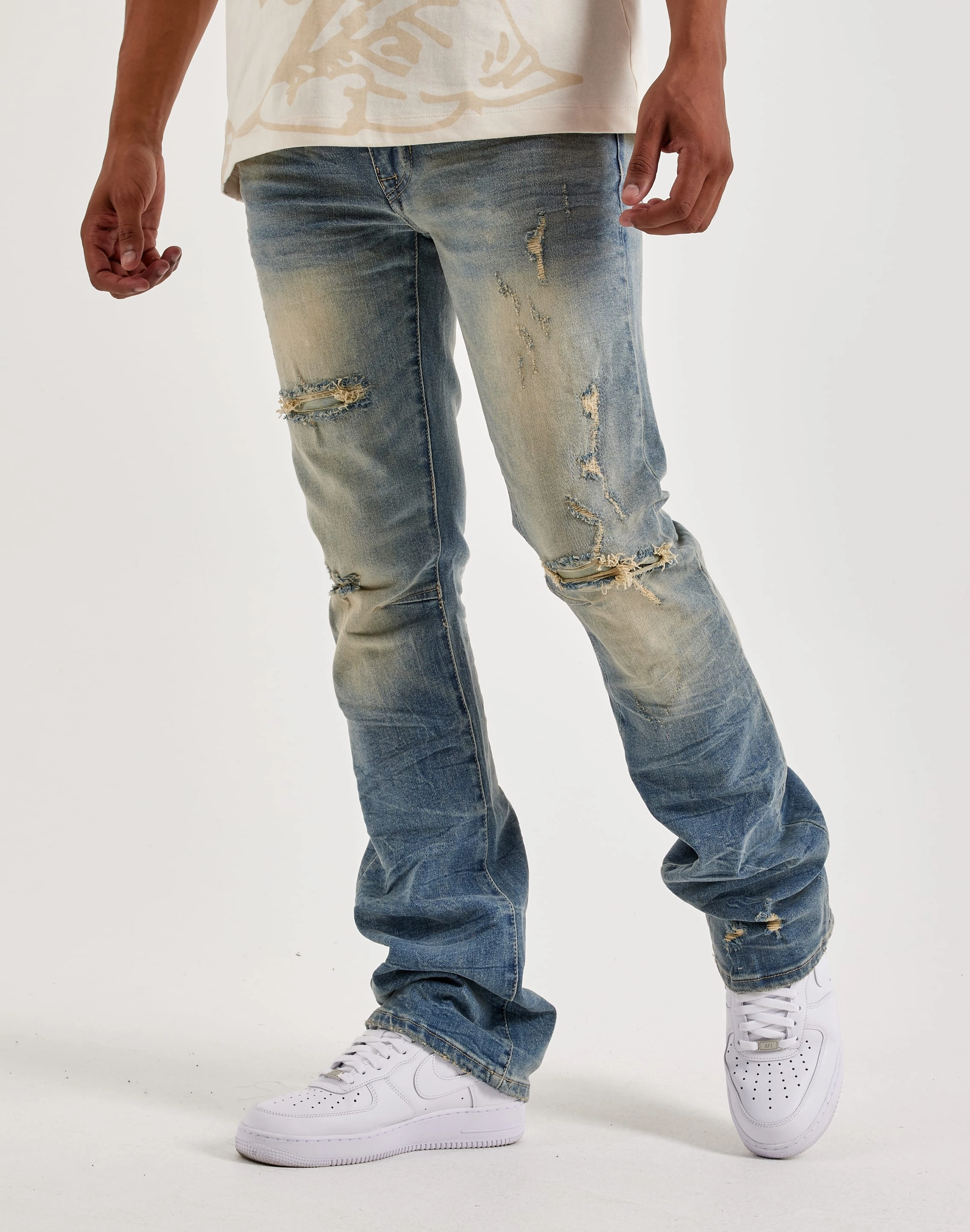 FlexibleMaterial EcoFriendlyTextiles Smoke Rise Distressed Stacked Jeans