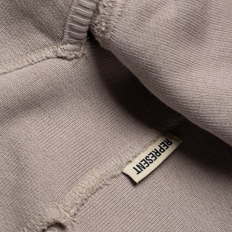 Represent Step Hem Hoodie - Oat Urban Energy