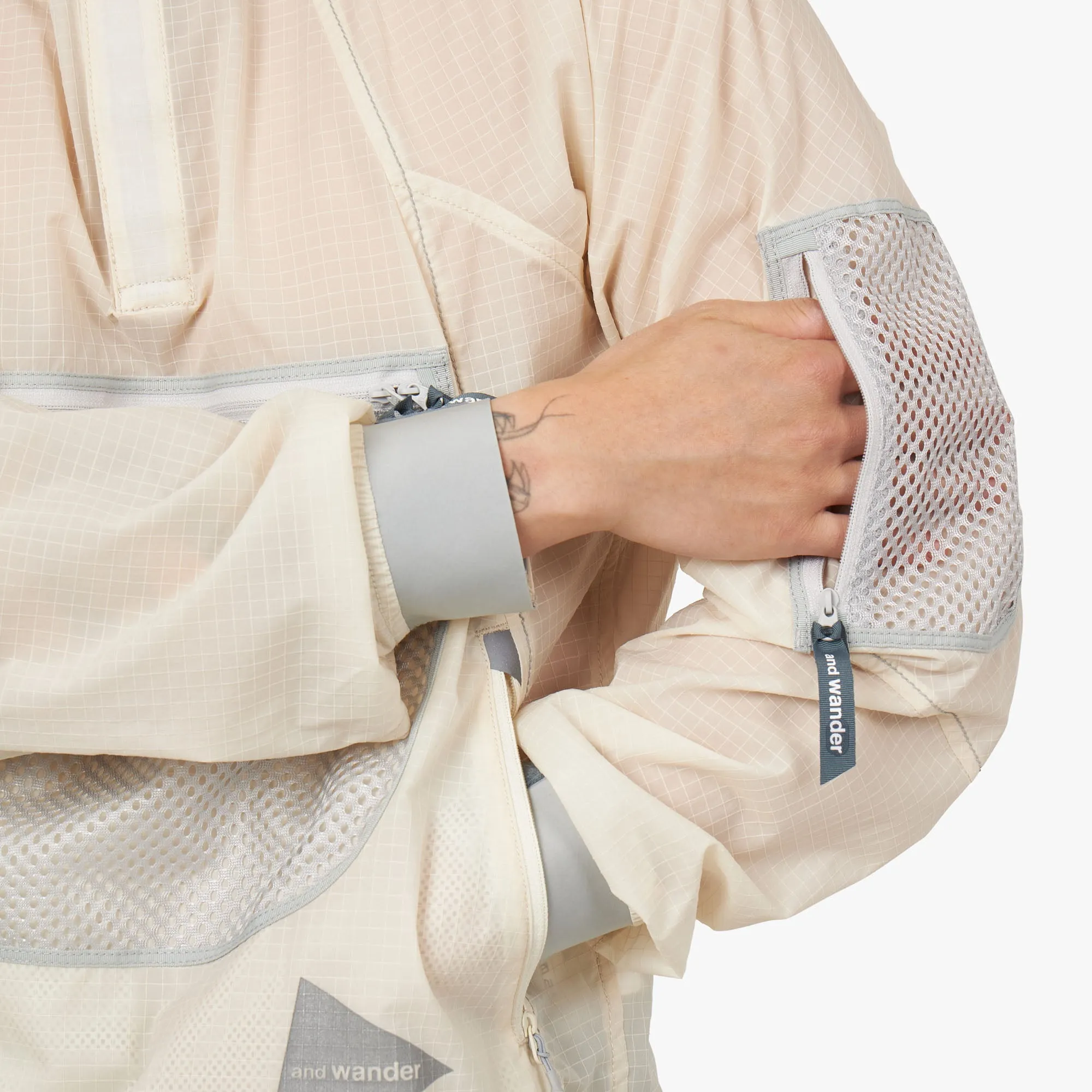 and wander Breath Rip Pullover Jacket / Off White Mold Resistant Coating Transitional Layer
