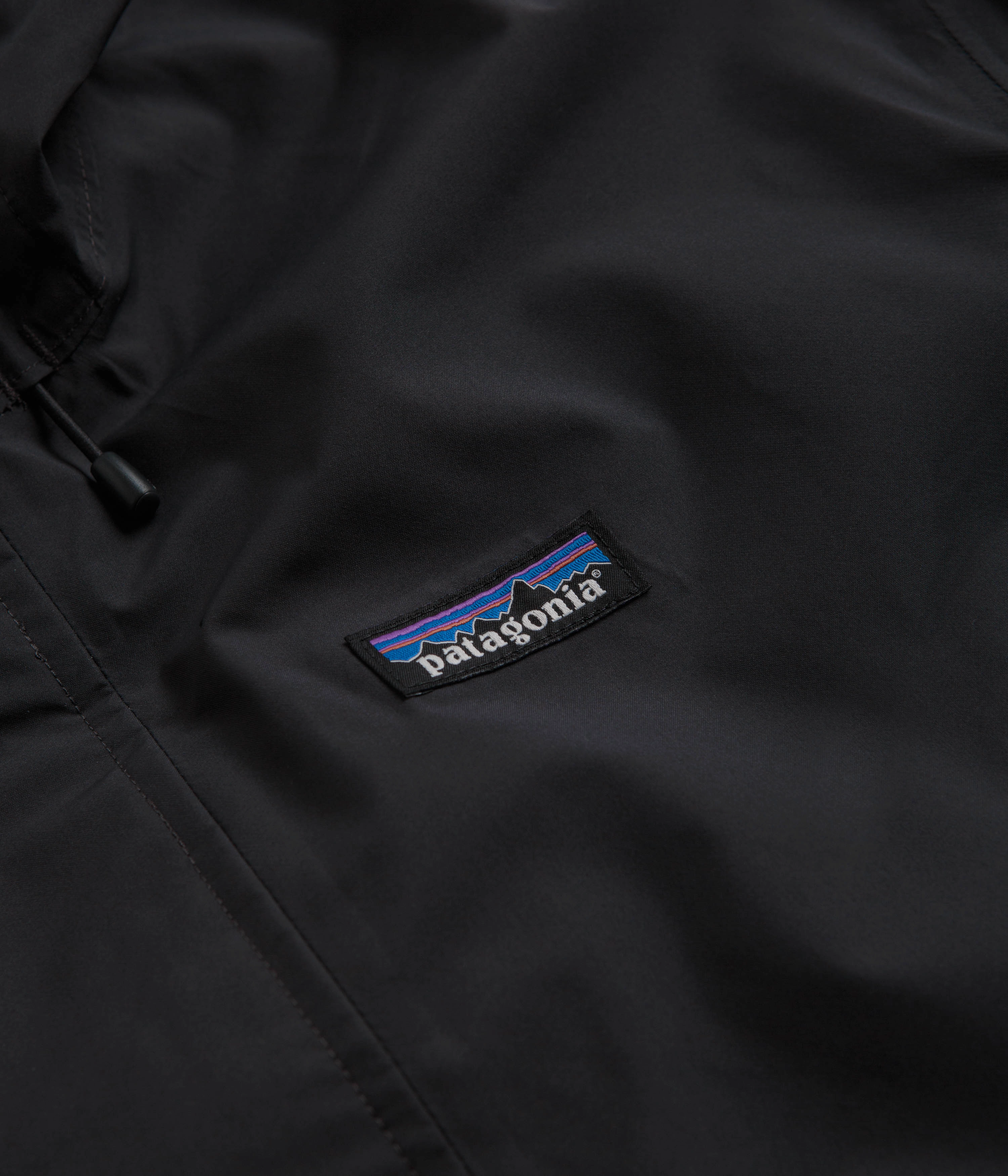 Patagonia Jackson Glacier Rain Jacket - Ink Black Adjustable Drawstring Waist