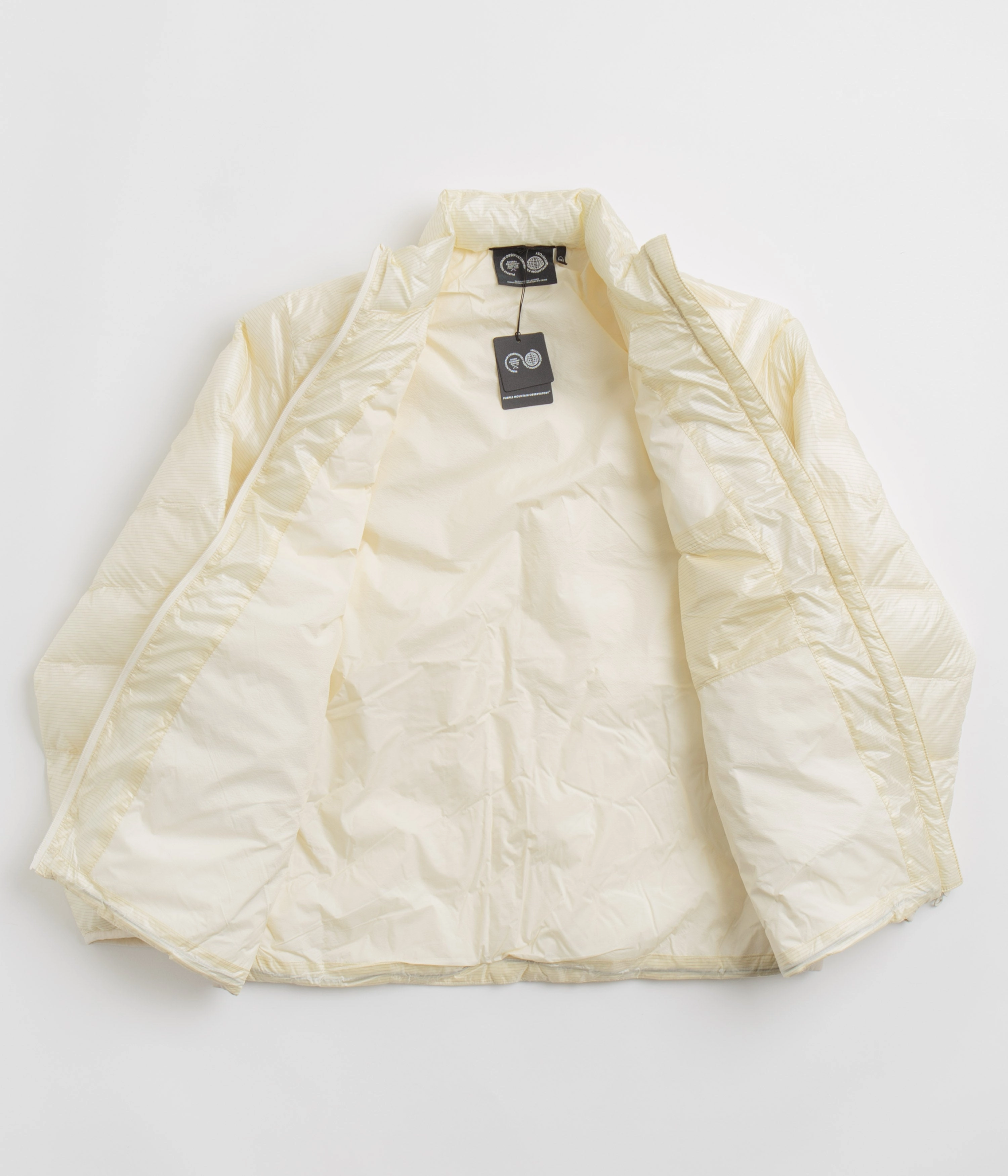 music concert Purple Mountain Observatory Waves Light Puffer Jacket - Ecru