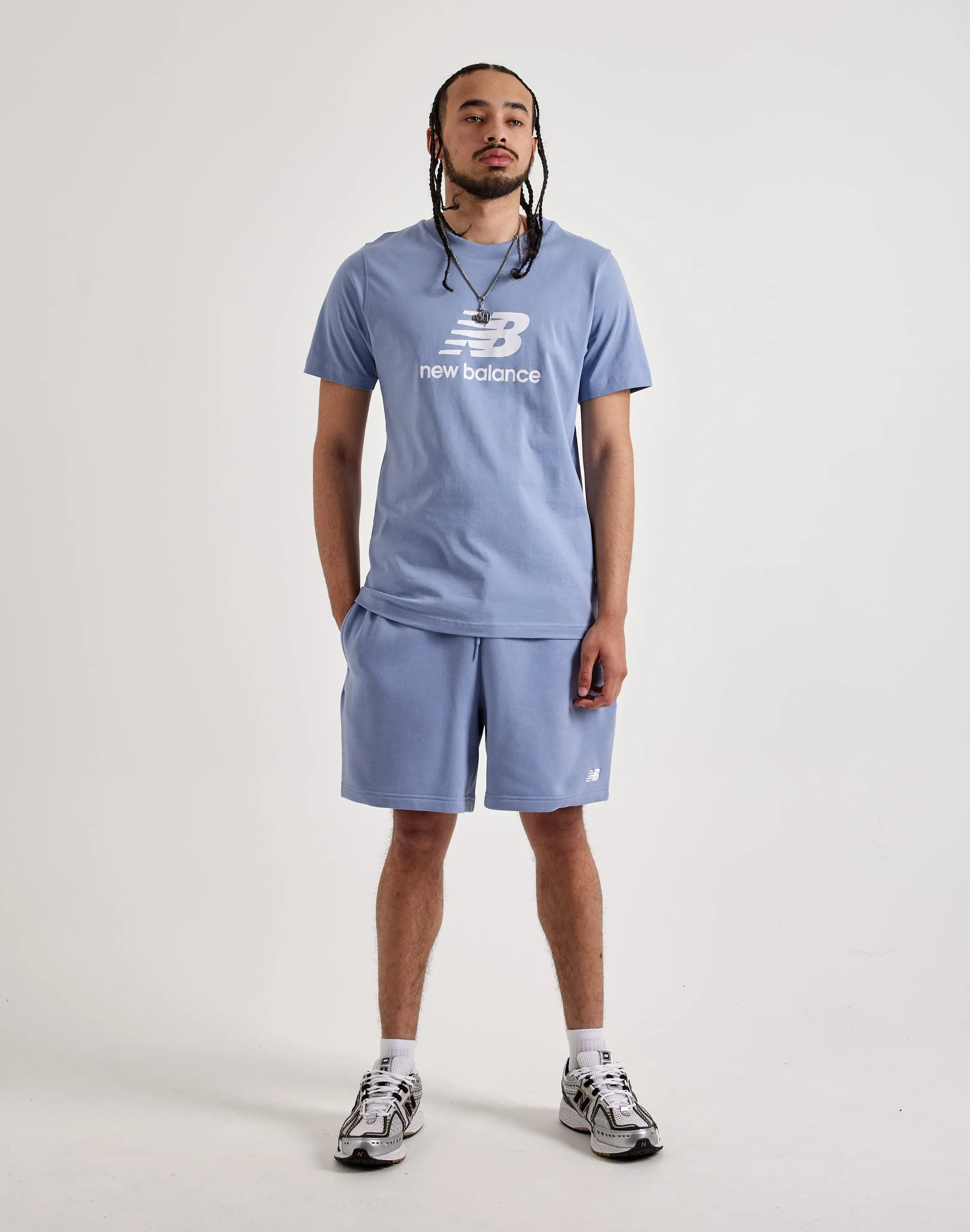 New Balance Essentials Stacked Logo Tee MultiFunctional Pockets Dense Fit