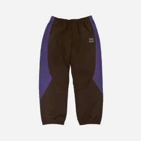 TECH LOGO TRACK PANT - BROWN / PURPLE Serene Ease