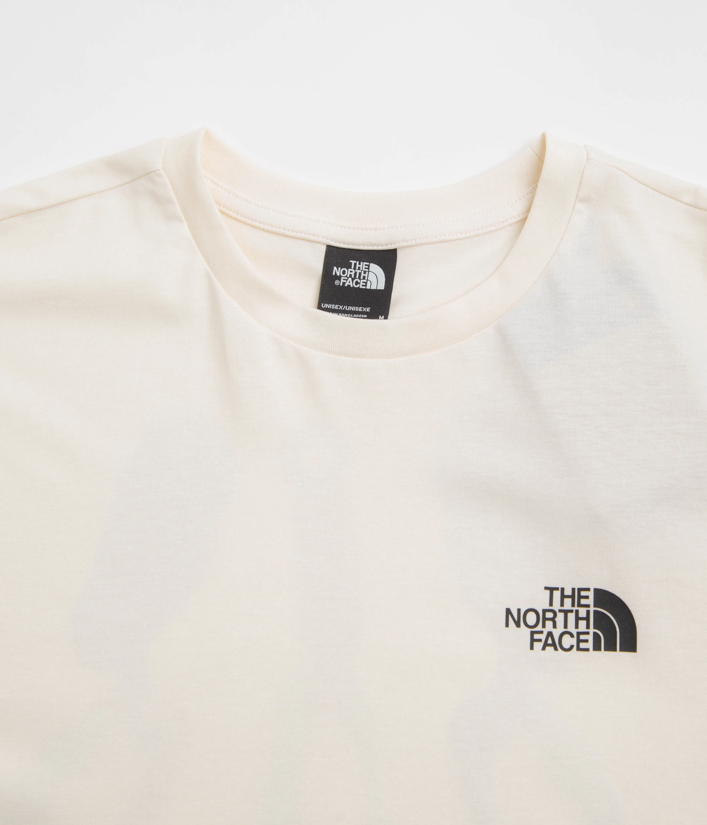 The North Face Explore Gear Relaxed T-Shirt - White Dune sheath silhouette