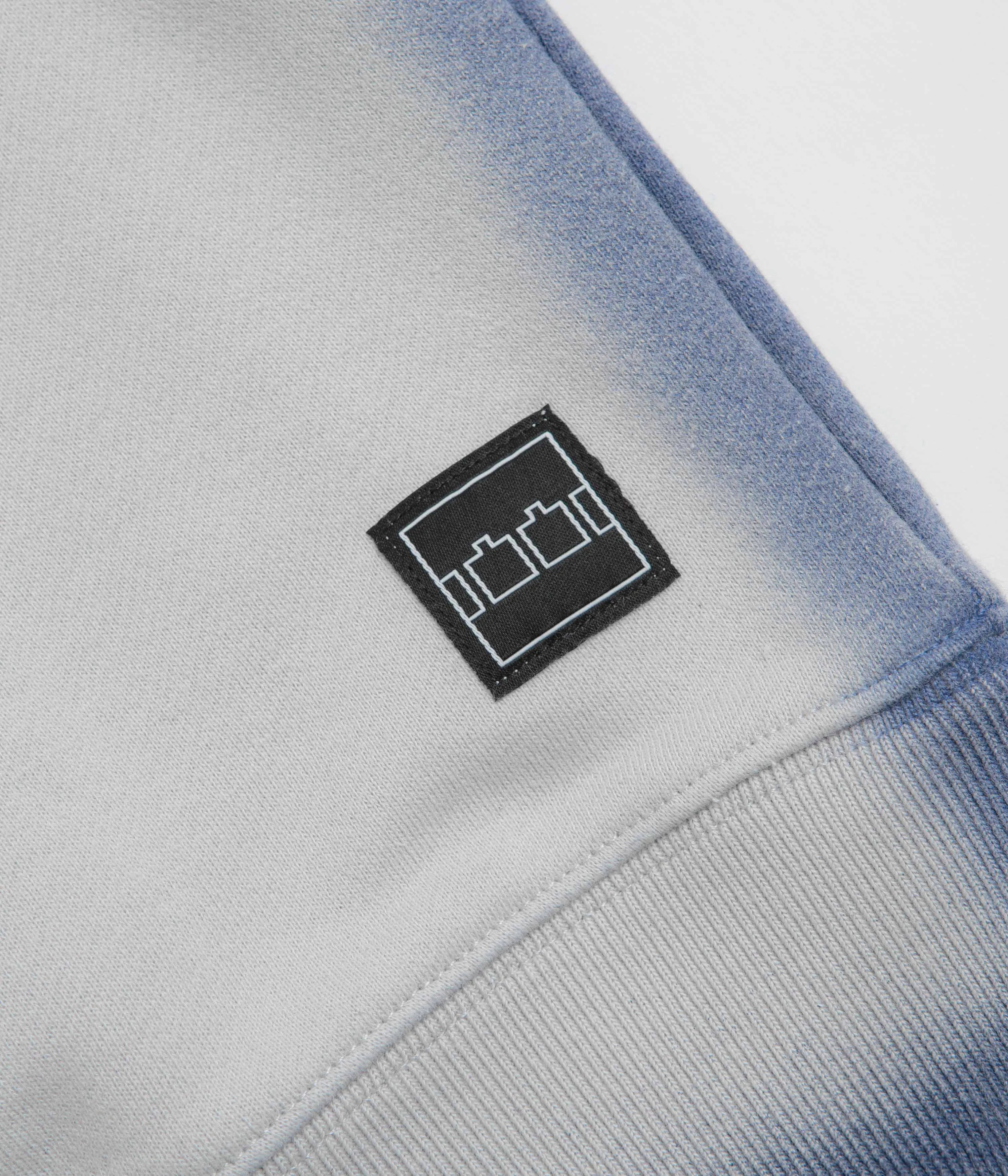 label accents The Trilogy Tapes Overdyed Crewneck Sweatshirt - Grey / Blue