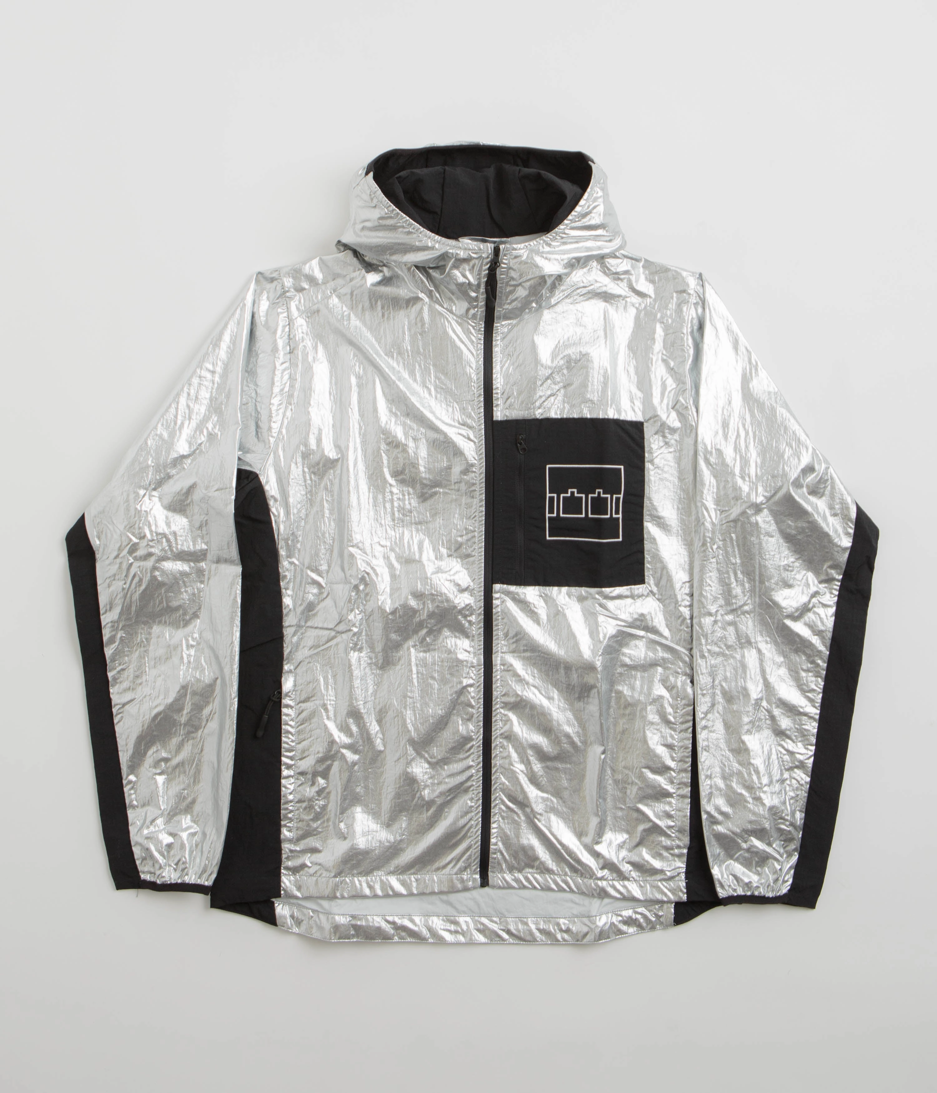 The Trilogy Tapes Lightweight Jacket - Silver Notice suitable for mountain hikes
