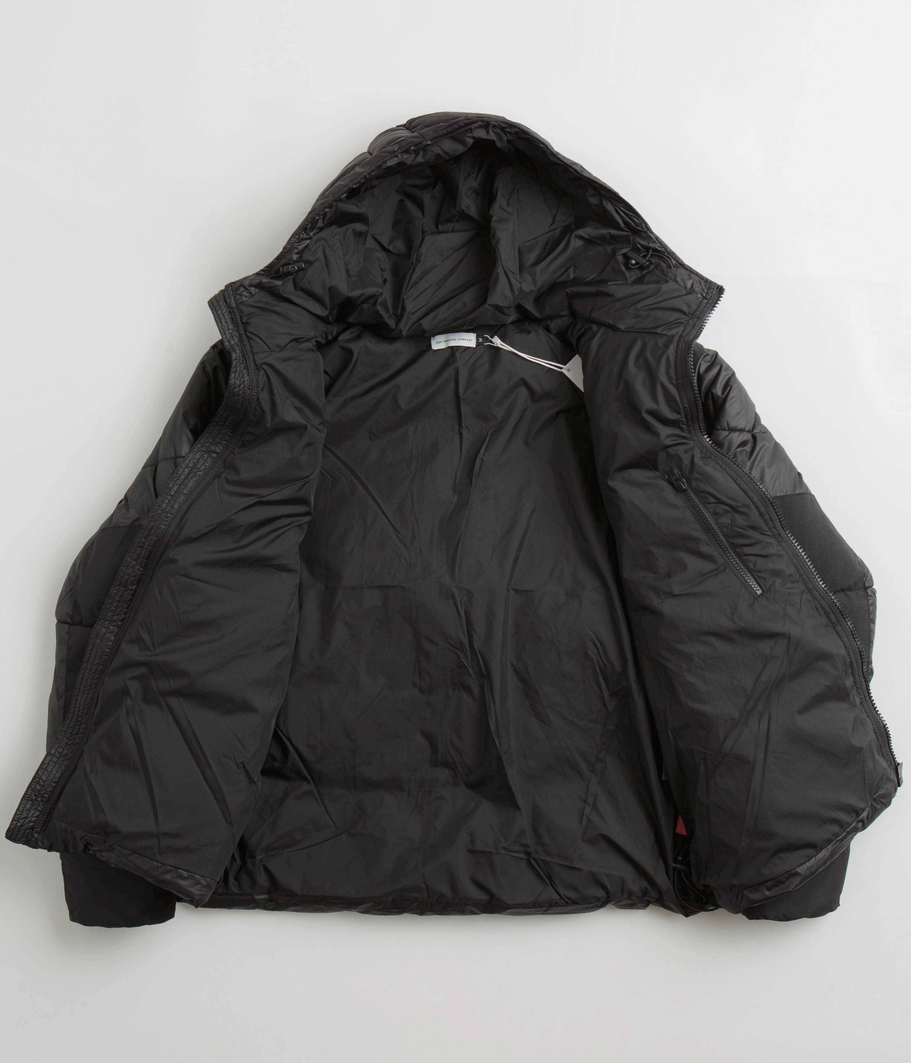 Pop Trading Company Puffer Jacket - Black Anti Slip Collar train journey